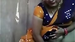 Indian aunty inserting cucumber in pussy