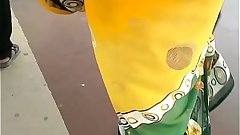HOT MOTHER SAVITA EXPOSING HER CURVY WAIST IN YELLOW SAREE